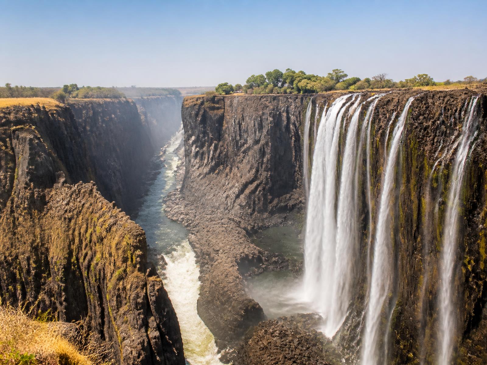 Victoria Falls in low-water season with exposed basalt cliffs